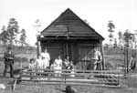 Choctaw Indians: Group of NIne Near Wood Frame Building