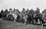 Crow Indians: A Group of Mounted Crow Women