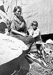 Navajo Indians: Navajo Indian and Child at their Home in Canon de Chelle