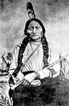 Sitting Bull: Portrait in Native Dress and Holding Pipe